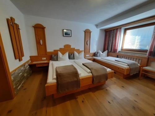 Кровать или кровати в номере Apart Al-Collina