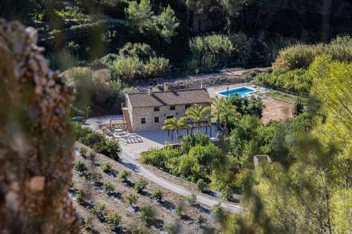 The swimming pool at or close to El Molinet del Governador- Apartamentos Rurales
