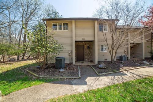 a house with a driveway in front of it at Mountainside Villas at Massanutten by TripForth in McGaheysville