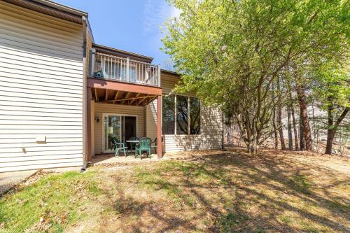 a house with a balcony and a patio at Mountainside Villas at Massanutten by TripForth in McGaheysville