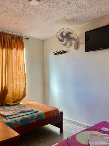 TV a/nebo společenská místnost v ubytování Hotel Mansión Real