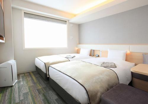 Lova arba lovos apgyvendinimo įstaigoje Urban Hotel Kyoto Gojo Premium