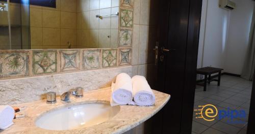 Ванна кімната в Village Club Premium - ePipa Hotéis