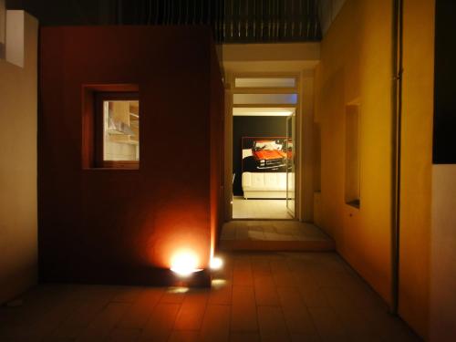 a hallway with a light on the floor at Villino Erminia - Seaside Art b&b in Pizzo
