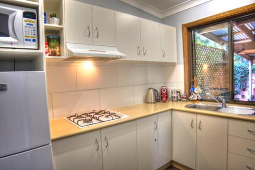 Una cocina o zona de cocina en Cabins @ The View