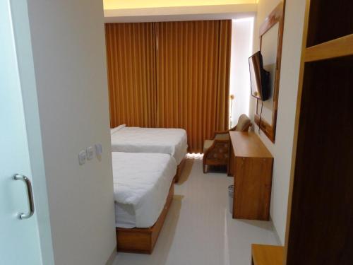 Postel nebo postele na pokoji v ubytování Diva Residence