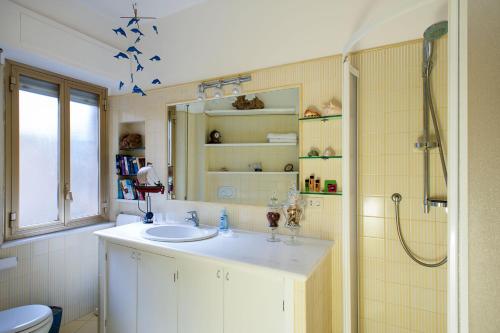 Ванна кімната в Residence Degli Agrumi Mare