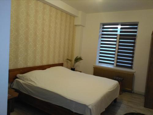 Ein Bett oder Betten in einem Zimmer der Unterkunft Habibi