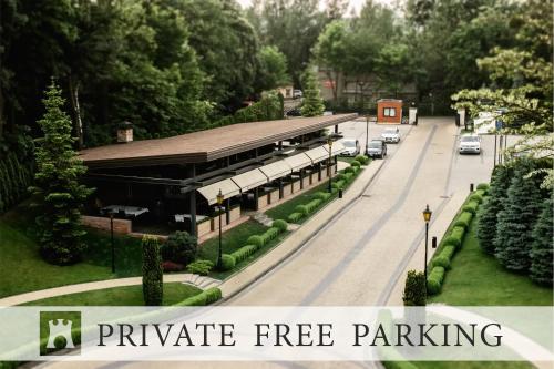 a rendering of a building with the words private free parking at Citadel Inn Gastro Boutique Hotel in Lviv