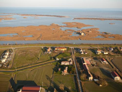 an aerial view of a small island in the water at Agriturismo Ca' Bonelli 1924 in Scardovari