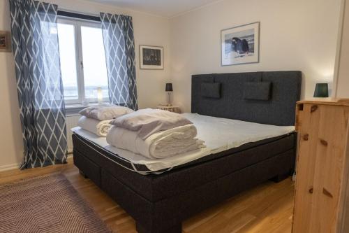 Säng eller sängar i ett rum på Berggatan Villa - Lägenhet 1