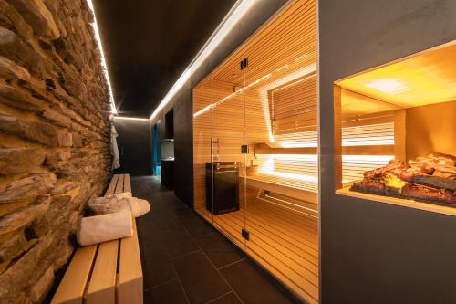 a room filled with lots of food and lots of windows at HB Aosta Hotel & Balcony SPA in Aosta