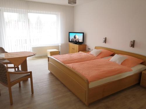 Cama o camas de una habitación en Haus Hönemann