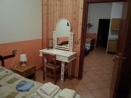 Postel nebo postele na pokoji v ubytování Azienda Agrituristica Pericle