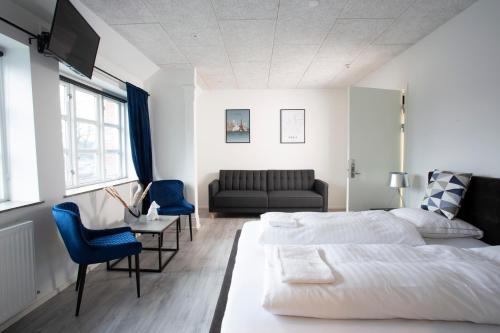 Postel nebo postele na pokoji v ubytování Hotelcity