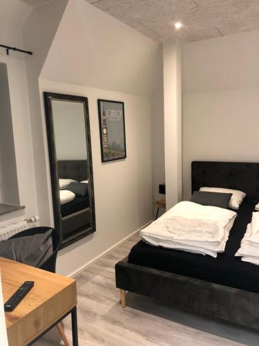 Ένα ή περισσότερα κρεβάτια σε δωμάτιο στο Hotelcity