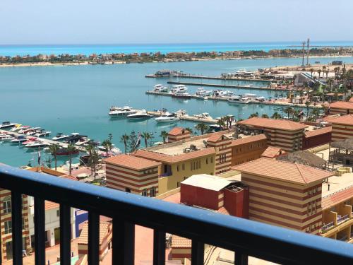 a view of a harbor with boats in the water at sea view apartment in Porto Marina in El Alamein