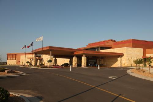 a parking lot in front of a shopping center at Grand Falls Casino & Golf Resort in Larchwood