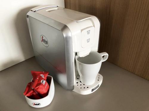 a coffee maker sitting on top of a counter at Residence Aurora in Lavarone