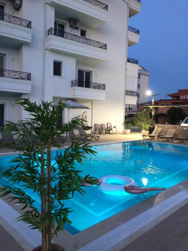 a swimming pool in front of a building at METROPOLIS in Ulcinj