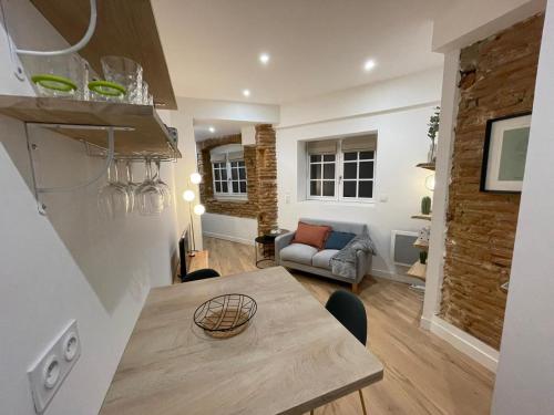 Kuchyň nebo kuchyňský kout v ubytování STUDIO CHARMANT-CONFORT-HYPERCENTRE-METRO-WIFI