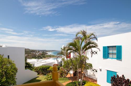 a view from the balcony of a white building at Santorini Thira 38 - Family Only in Ballito