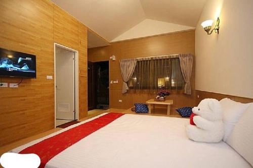 Katil atau katil-katil dalam bilik di Yun Cui Leisure B&B