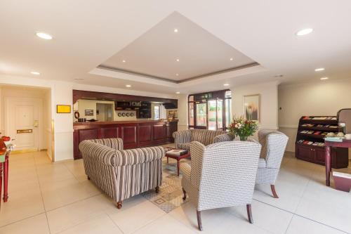 Χώρος καθιστικού στο Courtyard Hotel Rosebank