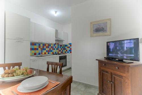 Kuchyň nebo kuchyňský kout v ubytování Residence Oasi e Oasi Blu