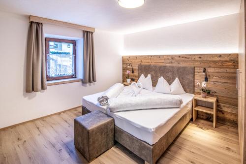 A bed or beds in a room at Apartments Heidenberger Delle Scuole