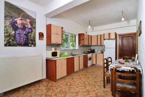 A kitchen or kitchenette at Villa Areti - A Cottage in the Cretan Nature