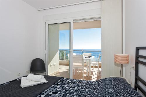 Posteľ alebo postele v izbe v ubytovaní Apartamento SAN FERMIN