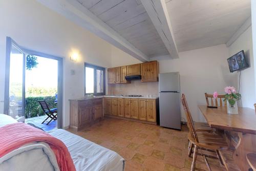 Kuchyň nebo kuchyňský kout v ubytování Residence Oasi e Oasi Blu
