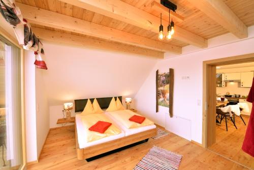 Tempat tidur dalam kamar di Urlaub im Stall