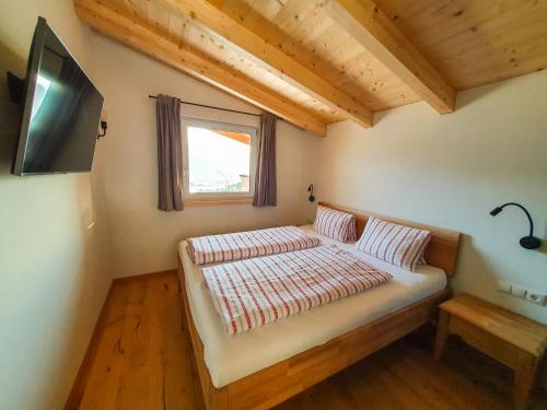 Postel nebo postele na pokoji v ubytování Das Haus Steger zu Stein