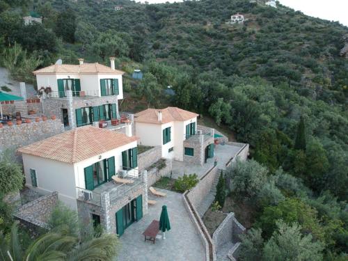 an aerial view of a house on a mountain at Kissakas Villas in Leonidion