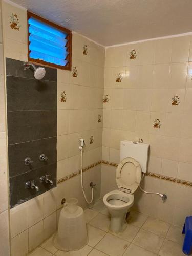 A bathroom at KVP RESIDENCY