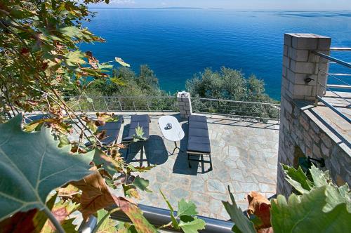 a view of the ocean from a house at Kissakas Villas in Leonidion