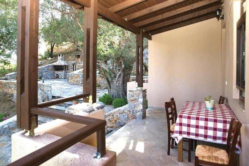 A restaurant or other place to eat at VILLA KALAMITSI ******* The CALM of MIND