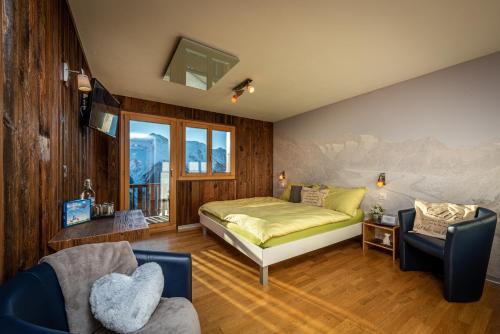 Postel nebo postele na pokoji v ubytování Hotel Slalom