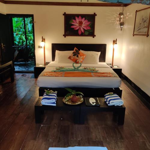 Amritara Shalimar Spice Garden Resort & Spaにあるベッド