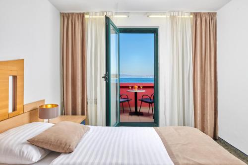 Postel nebo postele na pokoji v ubytování Veya Maradiso Hotel by Aminess