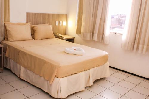 Cama ou camas em um quarto em Abbeville Hotel Torre II