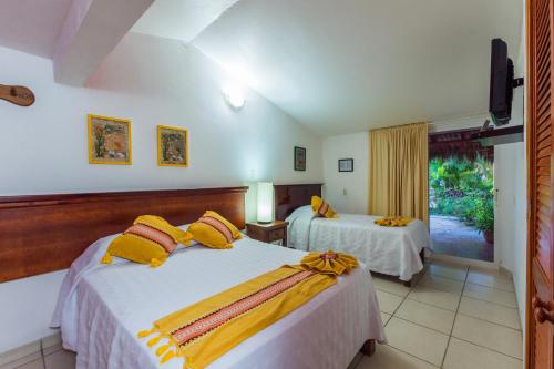 Voodi või voodid majutusasutuse Hotel Meson de Mita toas