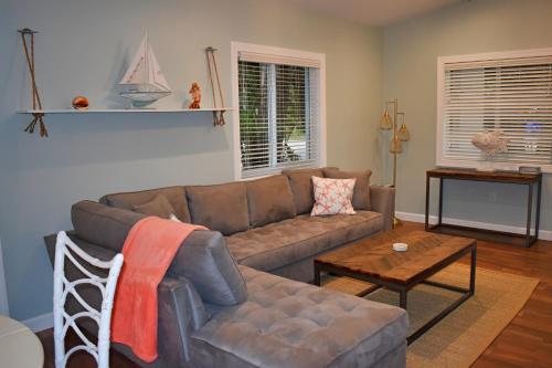 a living room with a couch and a table at Indian Mound in Tavernier