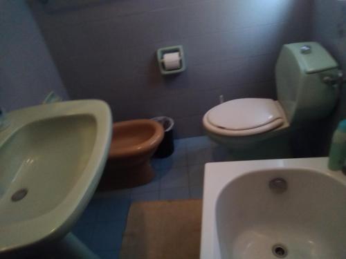 A bathroom at Room in Guest room - Room with Etna view