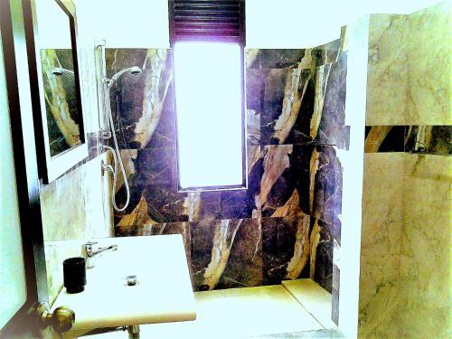 Un baño de Himagira Hotel