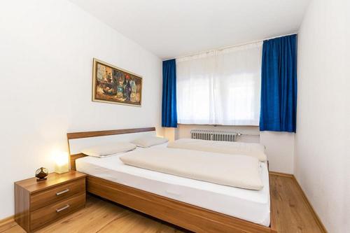Кровать или кровати в номере Ferienwohnung Kothen