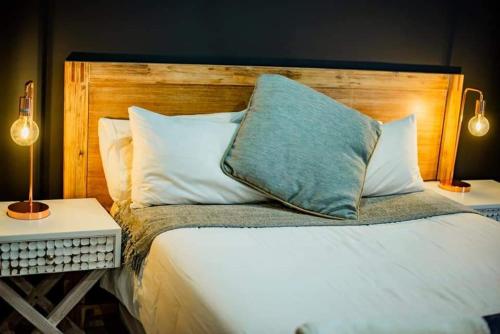 Een bed of bedden in een kamer bij Rue Guesthouse