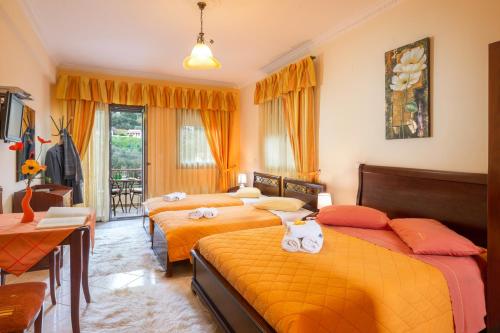 Postel nebo postele na pokoji v ubytování Hotel Eirini